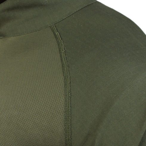Close-up of the shoulder seam on the Condor Long Sleeve Combat Shirt - Scorpion OCP, highlighting olive green smooth and textured fabric panels with visible stitching.
